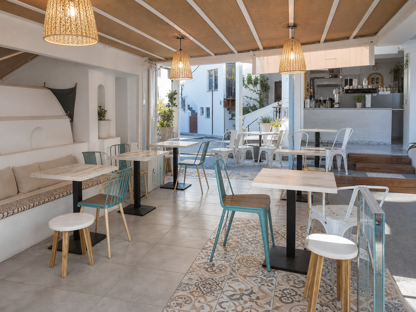 Bright compact cafe interior with turquoise and white seating